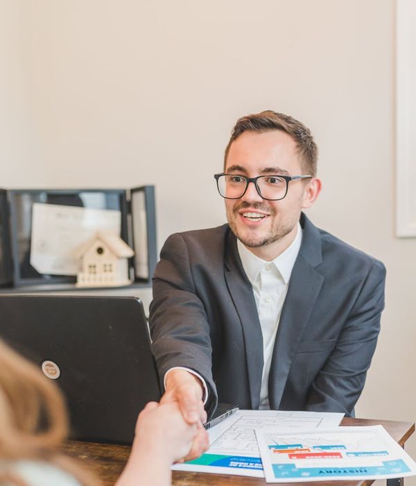 Customer satisfaction with completed home repair service and handshake